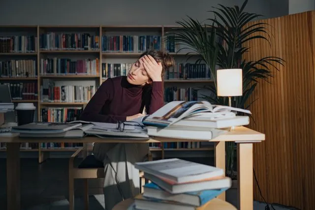 Student feeling stressed while preparing for an IELTS exam